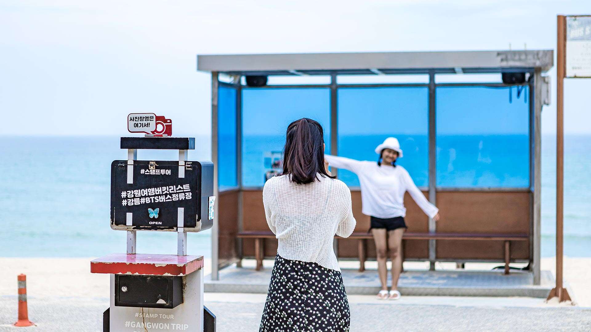 People enjoying the BTS bus stop photo zone 02