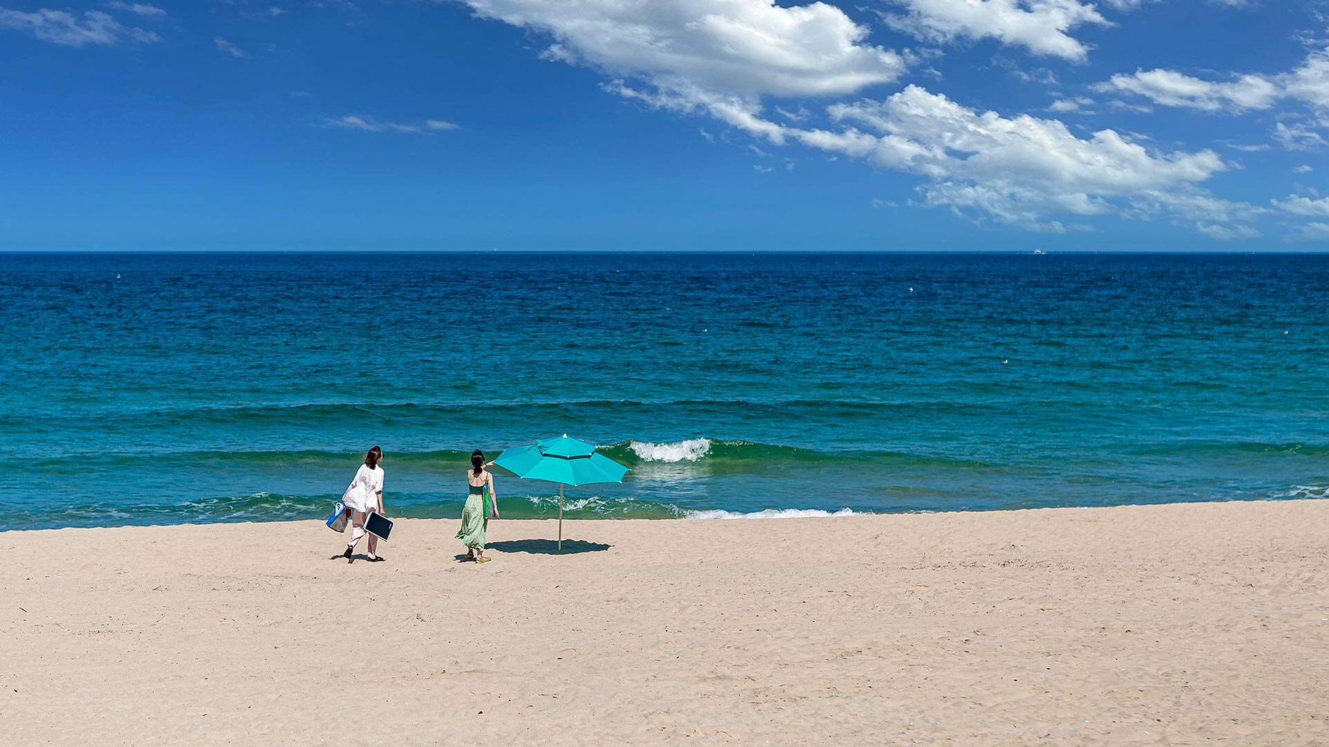 People enjoying the sea at Hyangho Beach