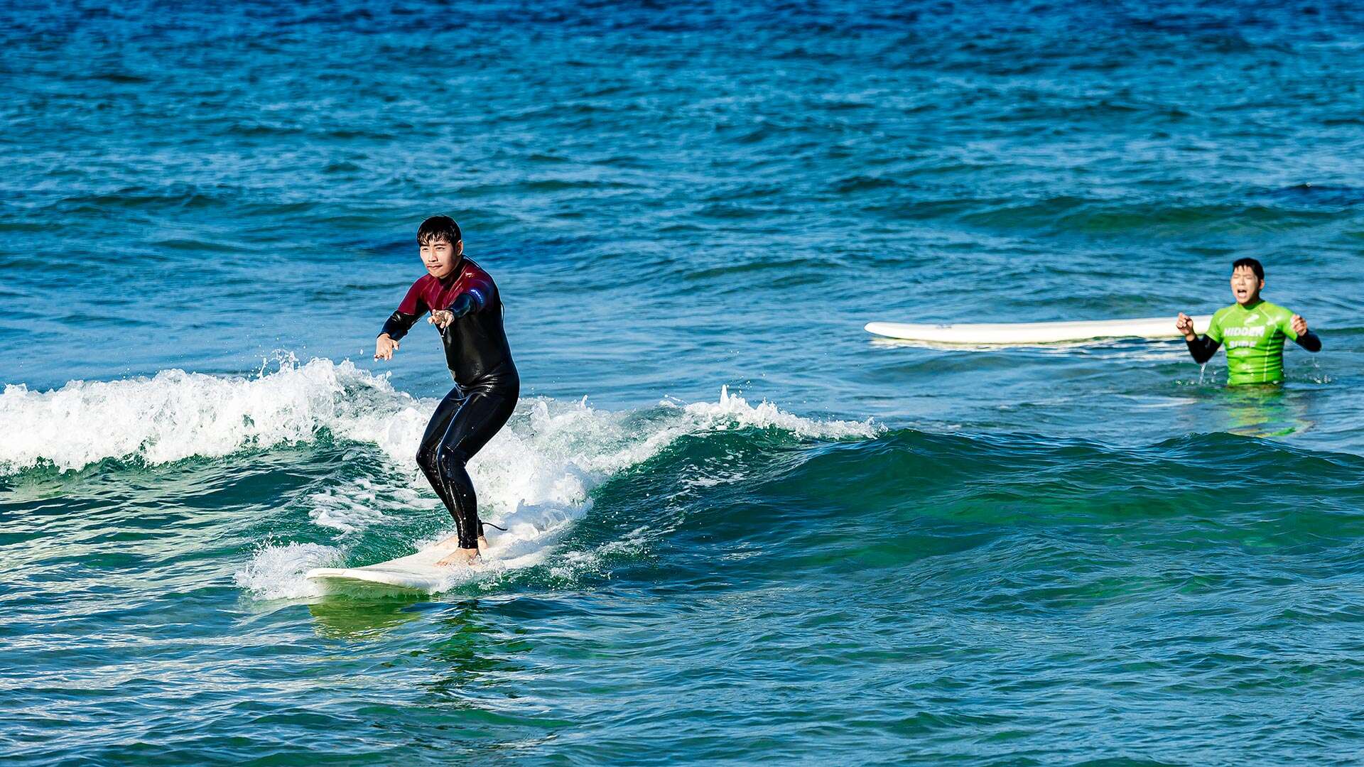 People enjoying surfing in the sea 07